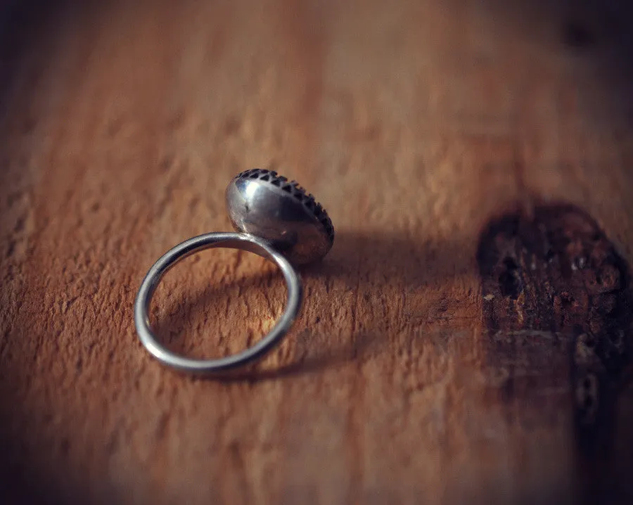 Black glass button ring